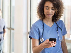 clinician on her smart phone