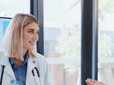 Doctors discussing data in a meeting